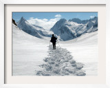 A Lone Mountain Hiker Walks in the Snow, Formazza Valley, Northern Italy Framed Photographic Print by Fabio Polimeni