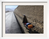 Child Uses a Wheel Barrow to Carry Jugs of Water, Logar Province, Afghanistan Framed Photographic Print