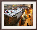 Indian Muslims During Friday Evening Prayers on the Rooftop of a Building over an Auto Parts Market Framed Photographic Print