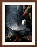 A Man, 24, from Ghana, Prepares His Meal Framed Photographic Print