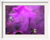 People Painted with Bright Colors Dance During the Festival of Holi on March 7, 2004 Framed Photographic Print by Anupam Nath