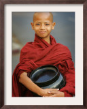 Young Myanmar Buddhist Monk Smiles Broadly as He Waits for Donations Early on a Yangon Street Framed Photographic Print
