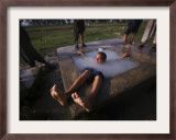 Youth Swims in a Water Reservoir as the Temperature Rises, on the Outskirts of Islamabad, Pakistan Framed Photographic Print