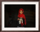 Girl Holds a Puppy as the Sun Sets over Kabul's Impoverished Teppe Maranjan Neighborhood Framed Photographic Print