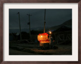 A Boy Prepares to Sell Bread Framed Photographic Print