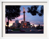Traffic Passes by the Angel of Independence Monument in the Heart of Mexico City Framed Photographic Print by John Moore