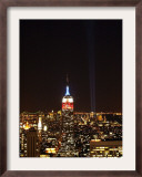Empire State Building in Red, White and Blue as Columns of Light Soar from World Trade Center Site Framed Photographic Print