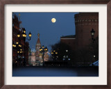 Moon is Seen over the Red Square in Moscow with the St. Basil Cathedral in the Background Framed Photographic Print