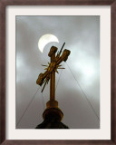 The Moon Partially Covers the Sun During a Partial Solar Eclipse Framed Photographic Print