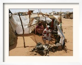 Two Sudanese Women Sit at a Make Shift Hut Framed Photographic Print