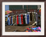 A Woman Buys a Dress Framed Photographic Print