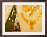 An Afghan Woman Looks for Gold at a Gold Shop Framed Photographic Print