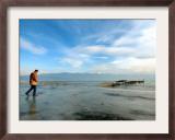 A Man Walks on the Ice-Covered Southeastern Macedonian Dojran Lake Framed Photographic Print