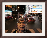 An Aka Hill Tribe Woman Smiles as She Waits to Sell Souvenirs Framed Photographic Print by David Longstreath