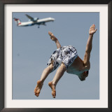 Man Jumps Close to a Landing Airplane in a Public Bath in Duesseldorf, Western Germany Framed Photographic Print