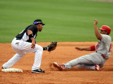 St. Louis Cardinals v Florida Marlins, JUPITER, FL - MARCH 06: Omar Infante and Jon Jay Photographie par Marc Serota