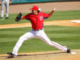 Florida Marlins v Washington Nationals, VIERA, FL - MARCH 02: John Lannan Photographic Print by Mike Ehrmann