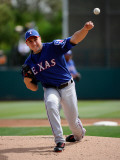 Texas Rangers v Los Angeles Dodgers, GLENDALE, AZ - MARCH 15: Derek Holland Photographic Print by Kevork Djansezian