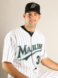 Florida Marlins Photo Day, JUPITER, FL - FEBRUARY 23: Burke Badenhop Photographic Print by Mike Ehrmann