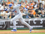 Los Angeles Dodgers v San Francisco Giants, SCOTTSDALE, AZ - FEBRUARY 26: James Loney Photographic Print by Rob Tringali