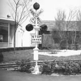 Railroad Crossing Stop Sign and Warning Light Photographic Print by George Marks