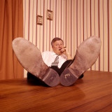 Proud Businessman Smoking Cigar With Feet Propped on Desk Photographic Print by H. Armstrong Roberts