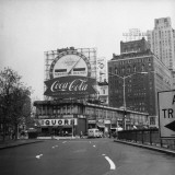 American City With Commercial Billboards Photographic Print by George Marks