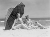 Two Women Sitting on Beach Under Parasol Photographic Print by H. Armstrong Roberts