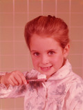 Girl, Wearing Bathrobe, Brushing Her Teeth in Bathroom Photographic Print by H. Armstrong Roberts Girl, Wearing Bathrobe, Brushing Her Teeth in Bathroom Photographic Print by H. Armstrong Roberts