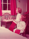 Twin Girls Holding Christmas Stockings, Looking Out of Bedroom Window Photographic Print by H. Armstrong Roberts