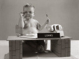 Baby at Desk Playing Loan Officer Photographic Print by H. Armstrong Roberts