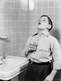 Boy Gargling in Bathroom Photographic Print by H. Armstrong Roberts