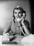 Female Telephone Receptionist at Information Desk, Answering Phone Photographie par H. Armstrong Roberts