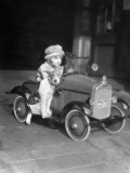 Girl in Toy Pedal Car With Dog Sitting on Running Board Photographie par H. Armstrong Roberts