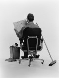 Janitor Sitting, Taking a Break, Reading the Wall Street Journal Newspaper Photographic Print by H. Armstrong Roberts
