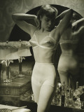 Young Woman in Underwear Standing By Mirror Photographic Print by George Marks