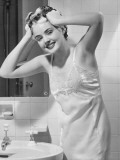 Young Woman Washing Hair at Bathroom Sink, Portrait Photographic Print by George Marks