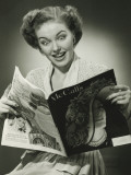 Woman Looking Surprised, Reading Fashion Magazine Photographic Print by George Marks
