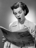 Woman Reading the Newspaper With Look of Surprise Photographic Print by George Marks