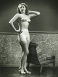Young Woman in Underwear and Stockings Posing Indoors Photographic Print by George Marks