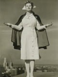 Female Nurse Standing on Rooftop Photographic Print by George Marks