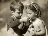Boy Gives Ice Cream To Sister Photographic Print by George Marks