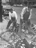 Two Men Using Jackhammers on Sidewalk Photographic Print by George Marks