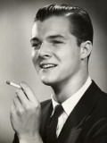 Young Executive Smoking Cigarette Photographic Print by George Marks