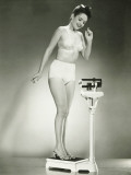Woman in Underwear Standing on Scale Photographic Print by George Marks