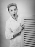 Astonished Nurse in Consulting Room Photographic Print by George Marks