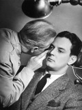 Doctor Examining Patient's Eyes Photographic Print by George Marks