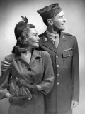 Man in Army Uniform With Woman Photographic Print by George Marks
