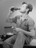 Worker Eating Lunch Photographic Print by George Marks