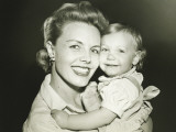Woman Hugging Daughter Photographic Print by George Marks